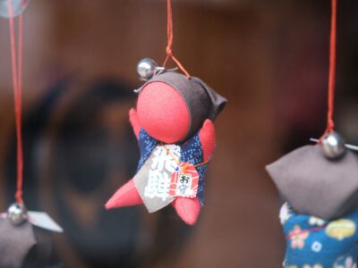 Sarubobo doll, Japanese amulet, in the town of Takayama in Gifu, Japan.